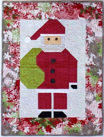 Holiday Quilting Pattern Parade: Santa quilt featured by top US quilting blog and shop, Seams Like a Dream Quilt Designs.