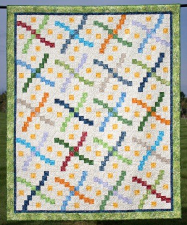 5 Fast and Easy Scrap Quilts you Can Do While at Home featured by top US quilting blog and shop, Seams Like a Dream Quilt Designs: Whirlybird a great scrap quilt