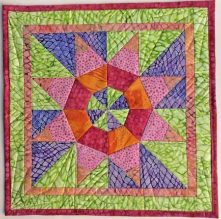 Island Batik paper piecing Project featured by top US quilting blog and shop, Seams Like a Dream Quilt Designs