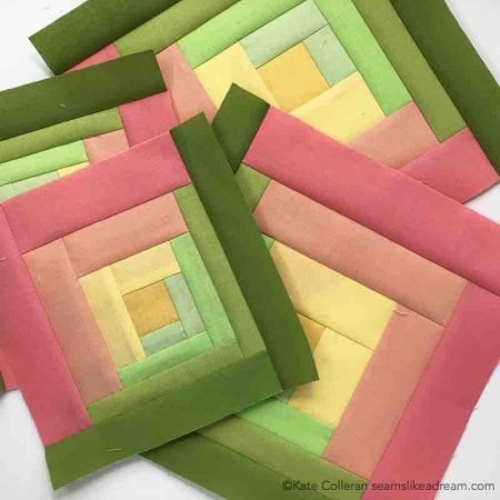 The Adventure Quilt ... a Road Trip Quilt Along Project, featured by top US quilting blog and shop, Seams Like a Dream Quilt Designs: coral and green log cabin blocks