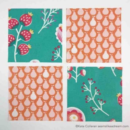 Four patch block in orange and green prints