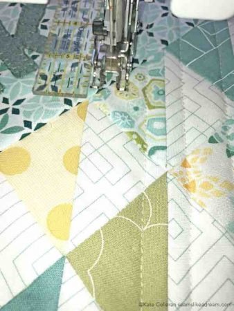 Text It! Book review featured by top US quilting blog and shop, Seams Like a Dream Quilt Designs: close up of quilting straight lines