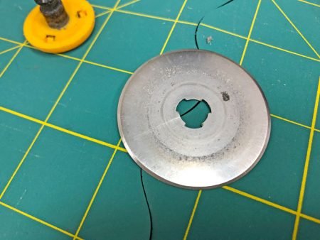 Exploring Quilting Basics: 4 Fabric Cutting Prep Tips featured by top US sewing and quilting blog, Seams Like a Dream: rotary blade