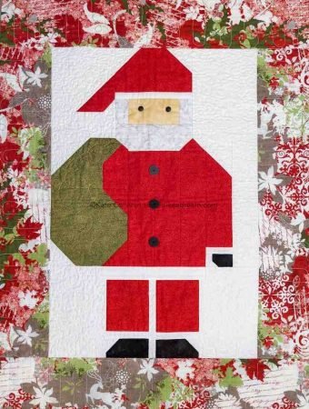 Top 10 Last Minute Quilting Gifts for quilters featured by top US quilting blog Seams Like a Dream Quilt Designs: image of  Quilted Santa wall hanging.