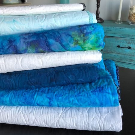 A Quilt Tutorial featured by top US quilting blog and shop Seams Like a Dream Quilt Designs, talks about making quilts.
