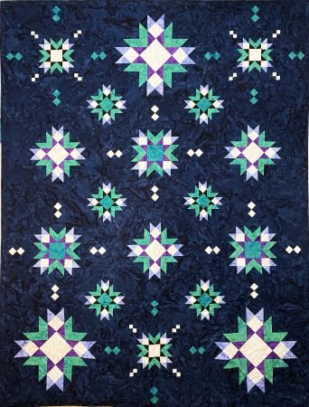 Top US quilting blog and shop, Seams Like a Dream Quilt Designs, shares her new star quilt pattern Astria! 