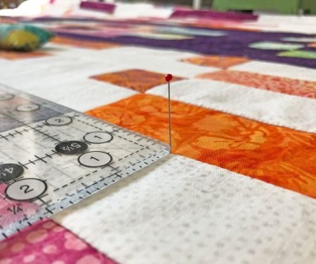 Top US quilting blog and shop, Seams Like a Dream Quilt Designs, shares tips to finish the quilt in the 2021 Lighthouse Steps Quilt Along!