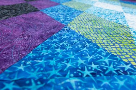 Top US quilting blog and shop, Kate Colleran Designs, shares about a new batik line, Moonlight Sky and new quilt patterns!