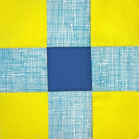 Top US quilting blog and shop, Kate Colleran Designs, shares about her nine patch block including a yellow and blue block!
