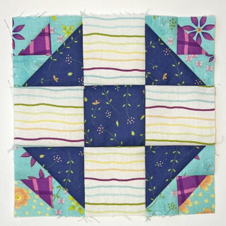 Top US quilting blog and shop, Kate Colleran Designs, shares about her August block challenge remix- the Shoo Fly quilt block!