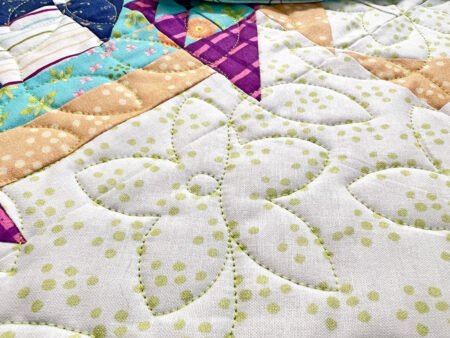 Top US quilting blog and shop, Kate Colleran Designs, shares about her August block challenge remix- the Shoo Fly quilt block!