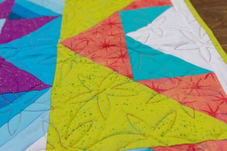Top US quilting blog and shop, Kate Colleran Designs, shares about the Old Maid's Puzzle quilt block and her remix!