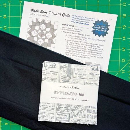 Top US quilting blog and shop, Kate Colleran Designs, shares about her remix of the Lady of the Lake quilt block! Image of a quilt pattern, charm pack and black fabric.