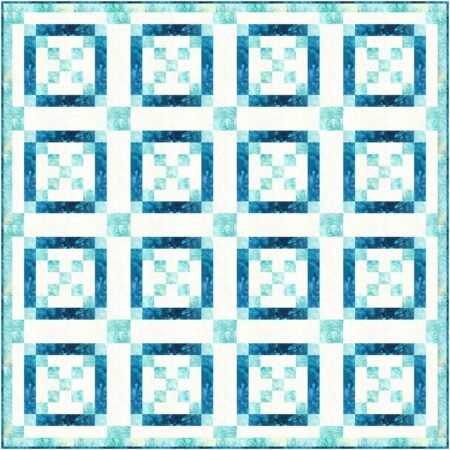 Top US quilting blog and shop, Kate Colleran Designs, shares about her January Quilt Block Remix block and quilt first draft. Image shown is a quilt made of squares and rectangles in light blue, off white and dark blue batik fabrics.