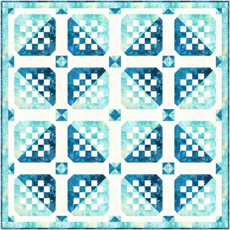 Top US quilting blog and shop, Kate Colleran Designs, shares her January Quilt Block Remix Challenge reveal. Image is a quilt made up of block with squares and rectangles in light blue, dark blue and white batiks.