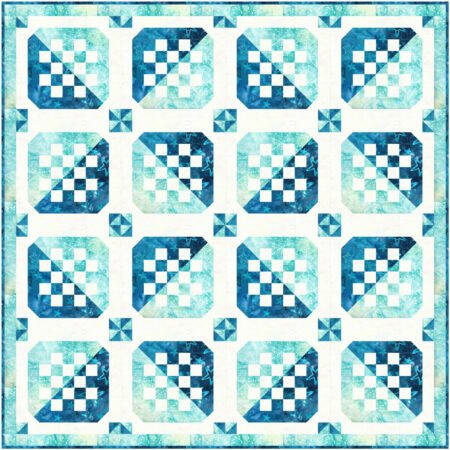 Top US quilting blog and shop, Kate Colleran Designs, shares her January Quilt Block Remix Challenge reveal. Image is a quilt made up of blocks with squares and rectangles in light blue, dark blue and white batiks.