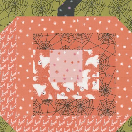 Top US quilting blog and shop, Kate Colleran Designs, shares about her new quilt along called Fall O'Ween! Image is a pumpkin quilt block in orange, green and black fabrics.
