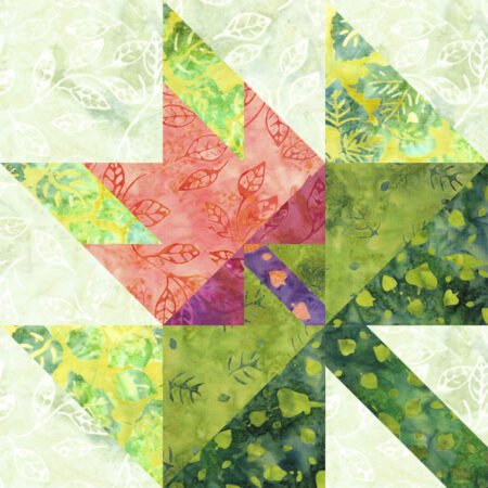 Top US quilting blog and shop, Kate Colleran Designs, shares about her September Block Remix challenge and her new block! Image is of a maple leaf in a maple leaf quilt block made in green, orange pink and purple batiks.