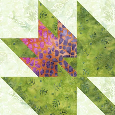 Top US quilting blog and shop, Kate Colleran Designs, shares about her September Block Remix challenge and her new block! Image is of a maple leaf in a maple leaf quilt block made in green, orange pink and purple batiks.