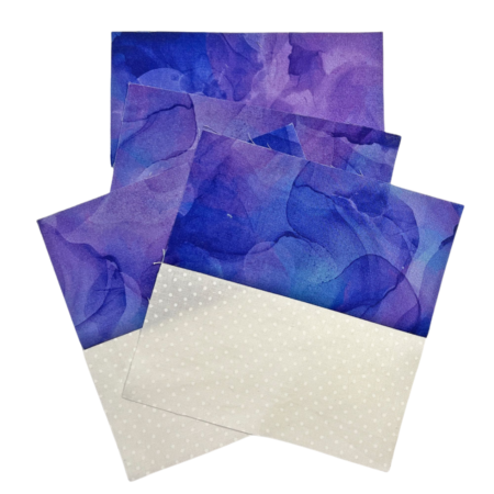 Top US quilting blog and shop, Kate Colleran Designs, shares about the Allure BOM quilt Block 6 and tips! Image is purple and white pieced fabric rectangles.