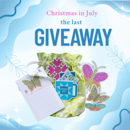 Top US quilting blog and shop, Kate Colleran Designs, shares about her Christmas in July posts and a last giveaway for the month! Image shows a gift bag with a notepad, butterfly stickers and quilt stickers