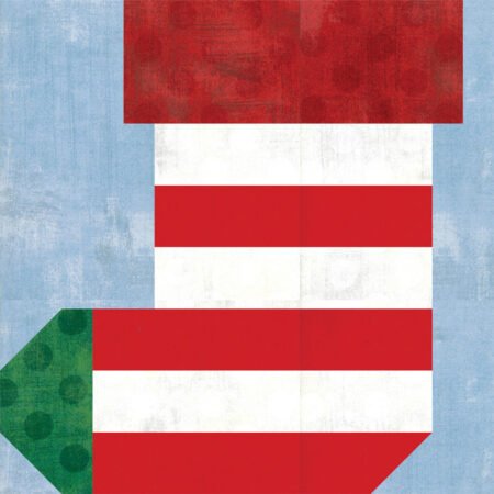 Jingle Bell Pines BOM Block Party Block 5 Jingle Socks! Image is a red and white Christmas stocking quilt block with a green toe and medium blue background.