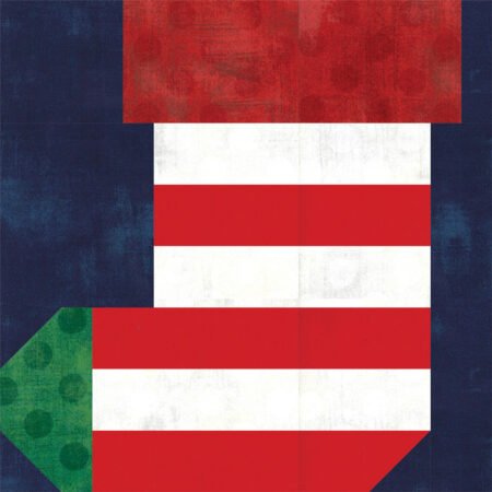 Jingle Bell Pines BOM Block Party Block 5 Jingle Socks! Image is a red and white Christmas stocking quilt block with a green toe and navy blue background.