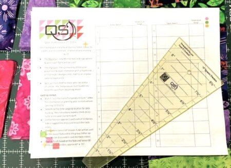 Top US quilting blog and shop, Kate Colleran Designs, shares about her 2026 temperature quilt and the braid blocks she will use! Image is a paper temperature tracker with a Dresden edge ruler on top and fabric strips underneath.